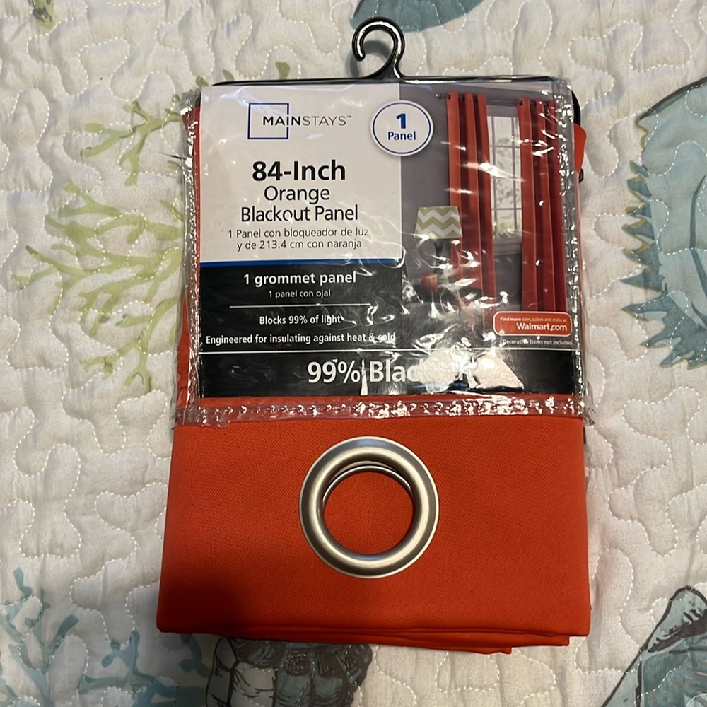 Mainstays brand 84 inch orange blackout curtain panel from Walmart with grommets